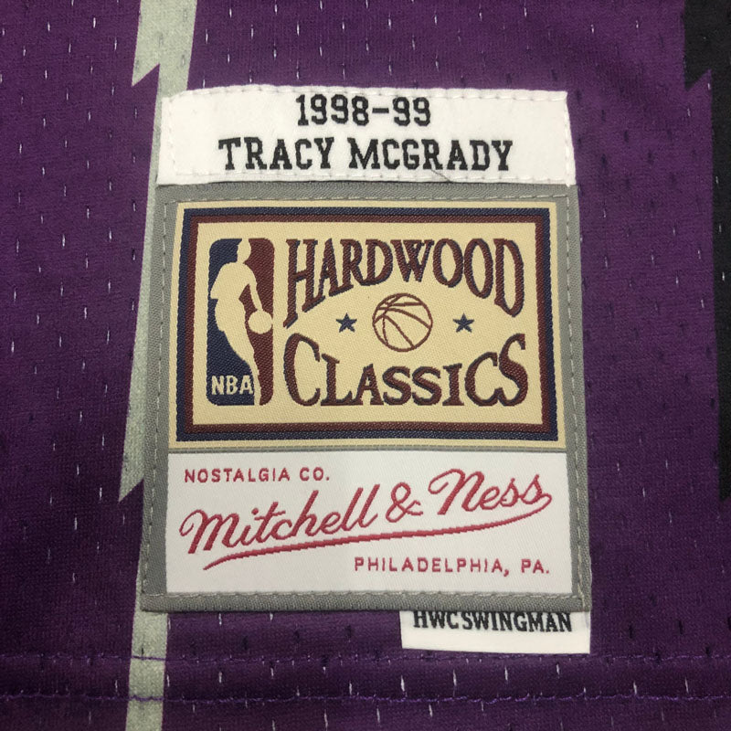 Regata Toronto Raptors Retrô Mitchell & Ness 1998/1999 McGrady Roxa